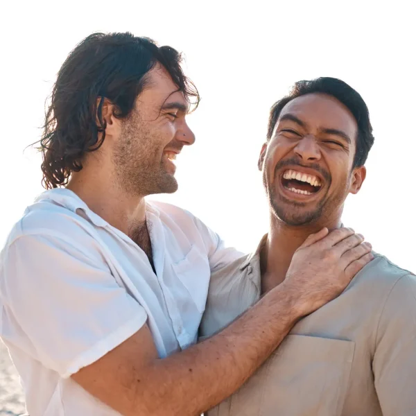 tinywow_tinywow_love-laughing-and-gay-couple-on-beach-hug-and-sm-2023-11-27-05-32-40-utc_68945606_68945724